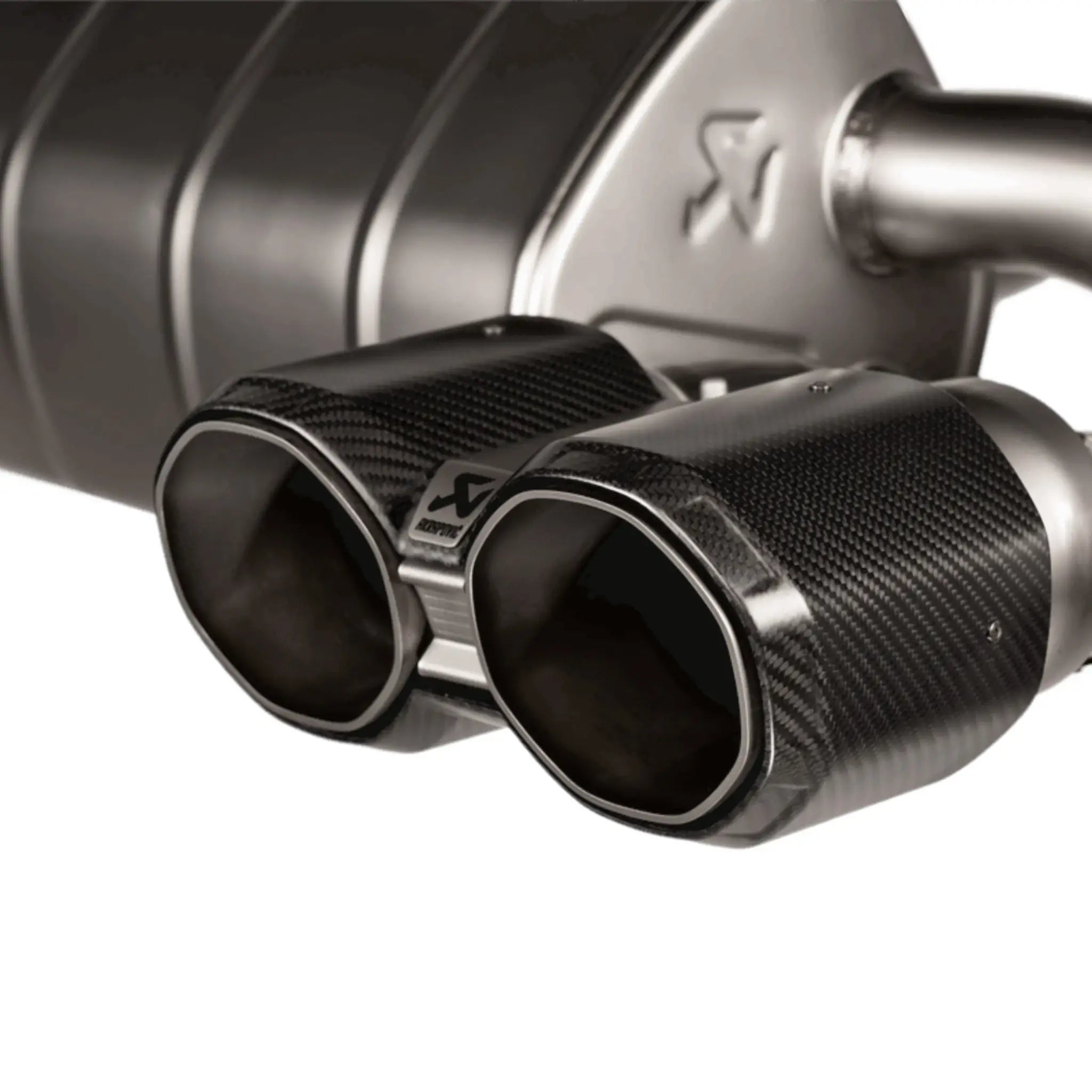 Close-up of Akrapovic Slip-On Line Titanium Performance Exhaust for BMW M2 G87, highlighting precision-crafted components and premium finish.