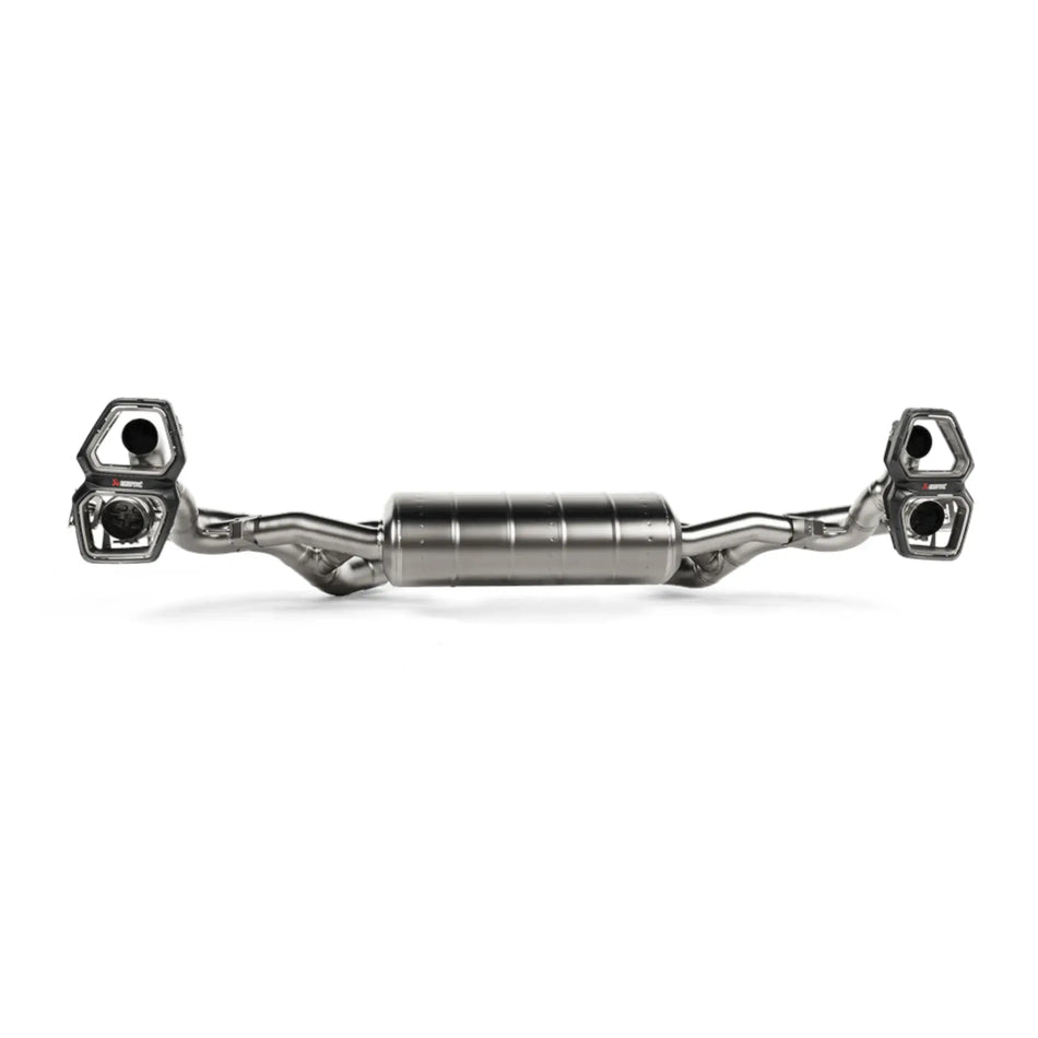 Akrapovič product shot showcasing the high-grade titanium Slip-On Line (Titanium) exhaust system, emphasizing its lightweight construction and engineering excellence.